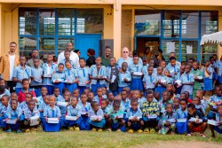 Power of the Cross Ministries and American Joe Support 100 Children at EP Cyeru with Supplies and Meals