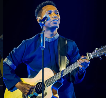Israel Mbonyi's deep love for FC Barcelona: Does supporting a Football Club affect a worship leader's faith?